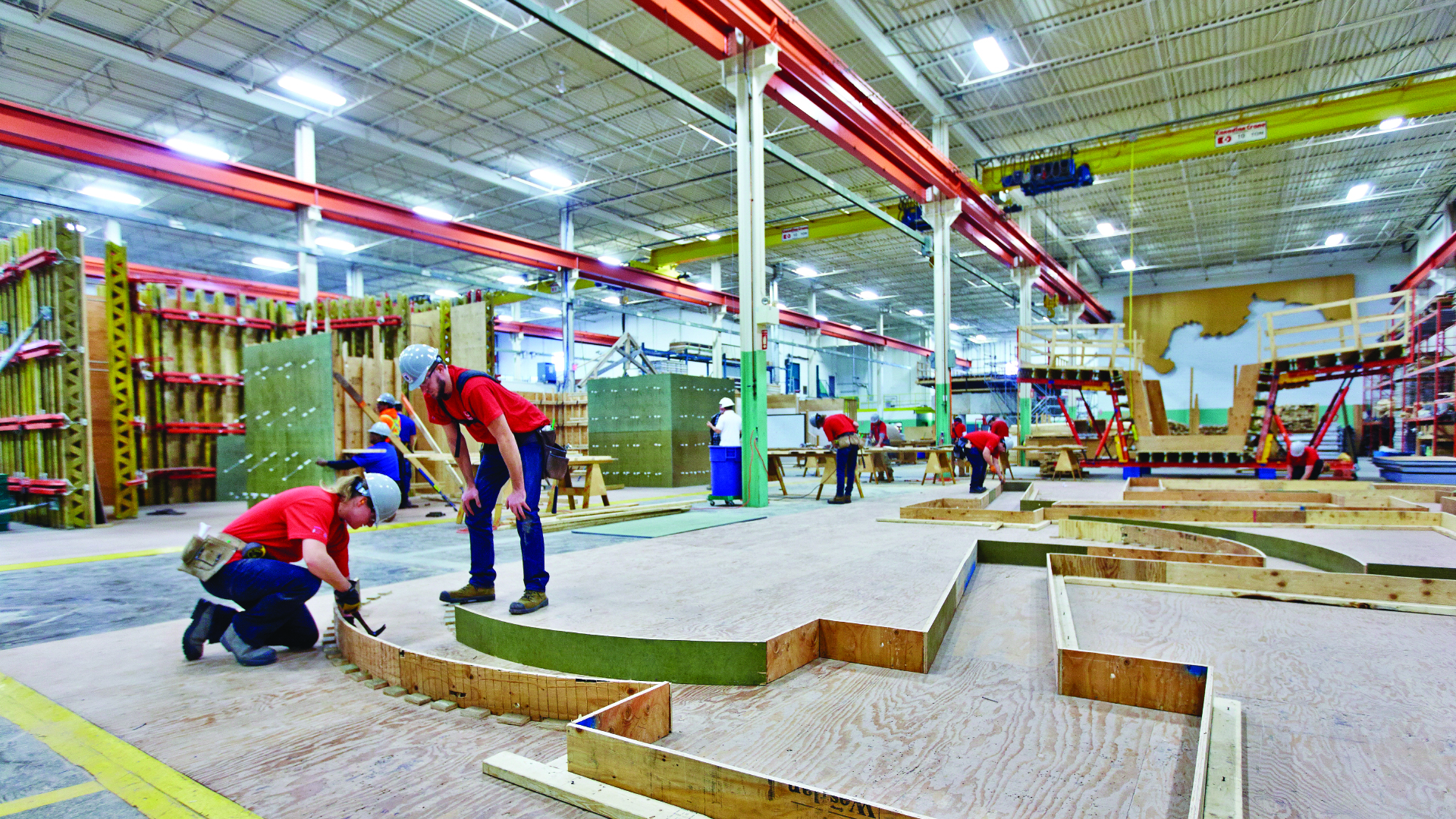 Employees working on a wood project